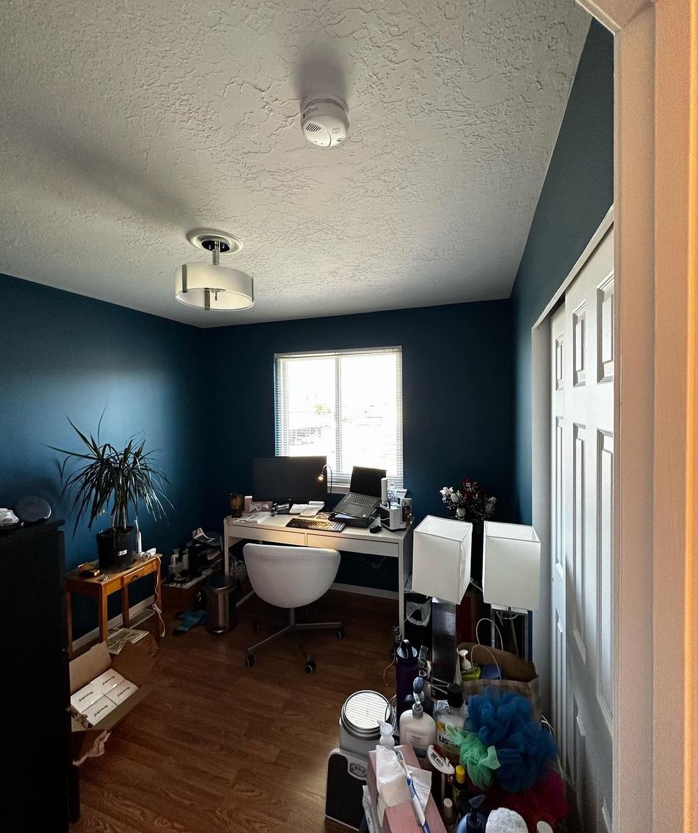Finished home office with deep navy walls, Valley Painters LLC