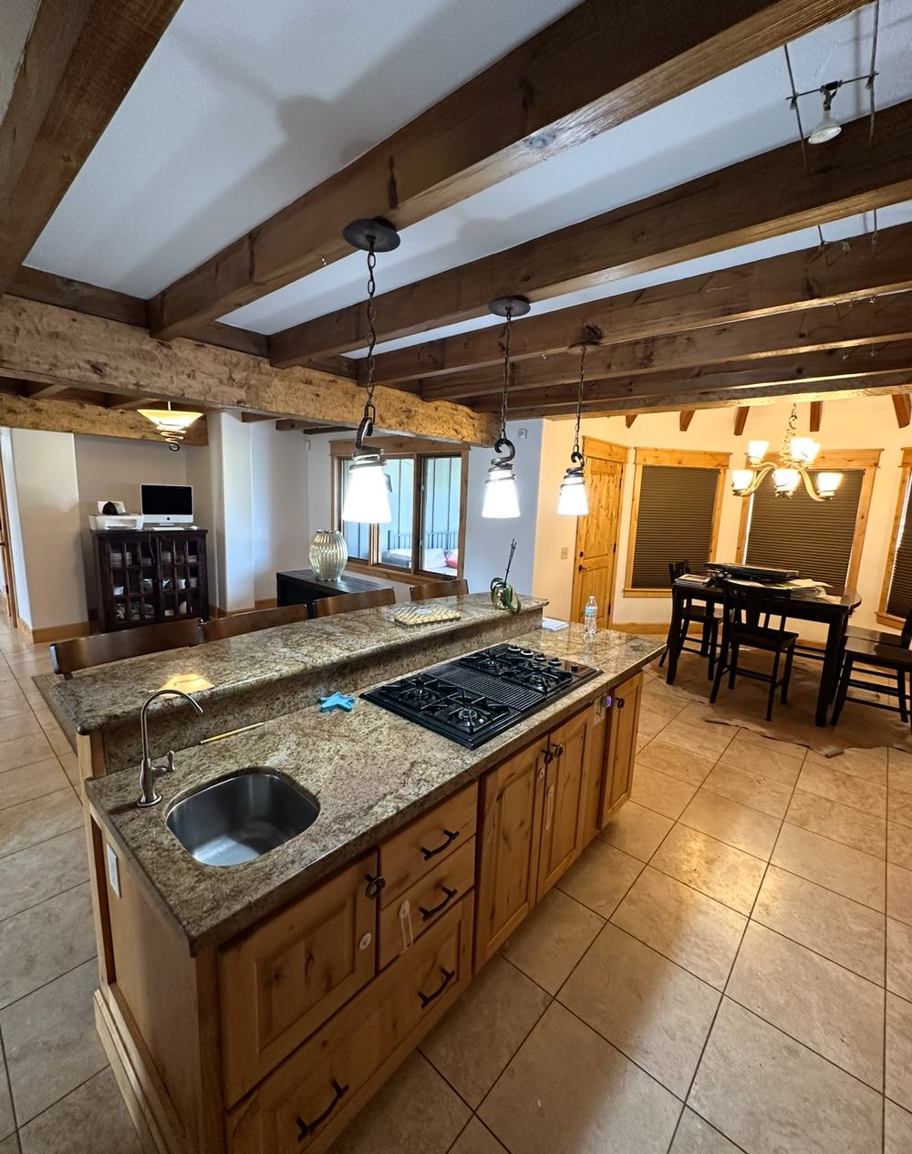 Finished rustic kitchen with wood beams
