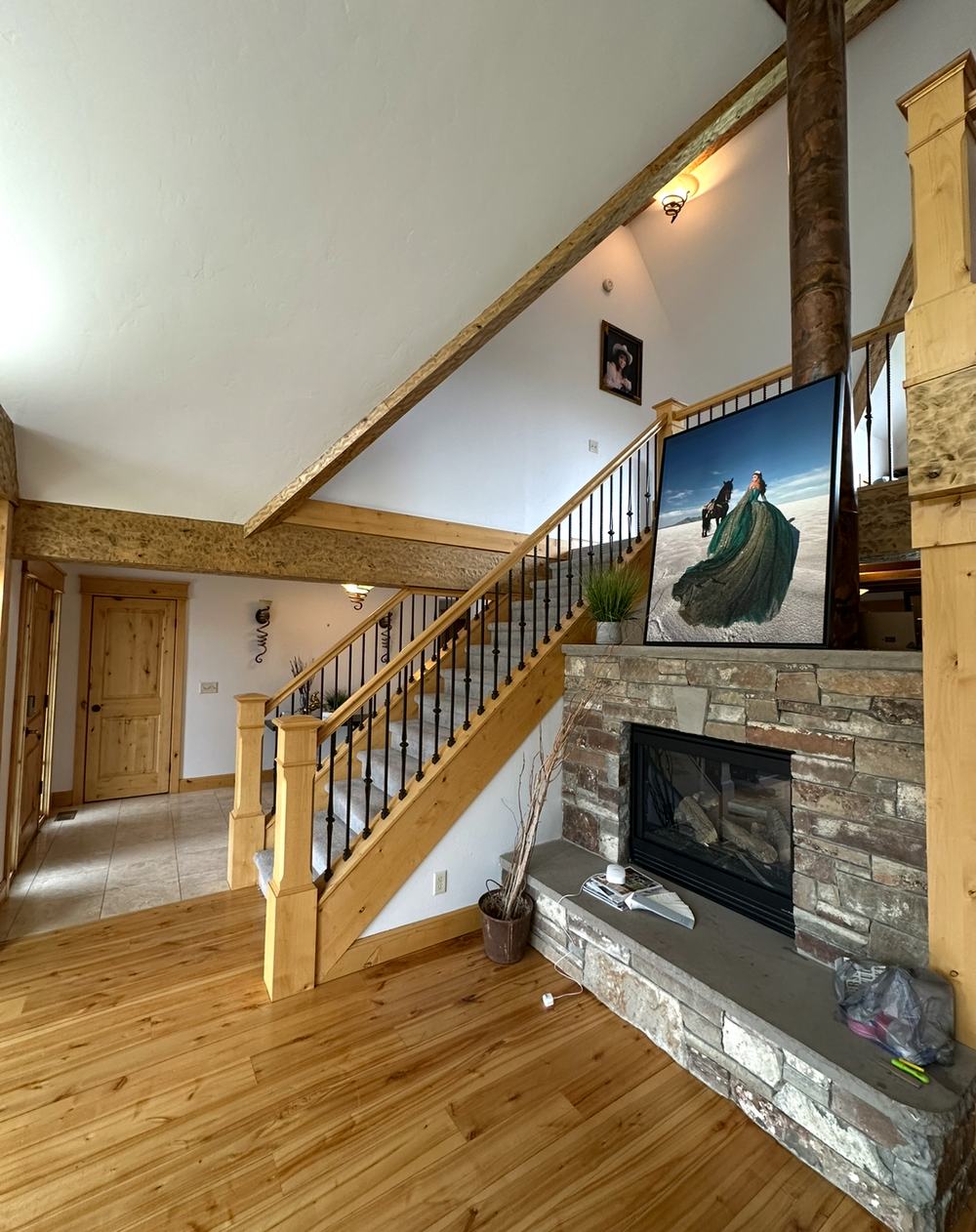 Finished staircase and stone fireplace